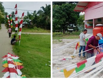 Menyambut HUT Kemerdekaan RI ke 77 Tahun Pemerintah Desa Menghiasi Jalan Dengan Umbul Umbul Secara gotong royong